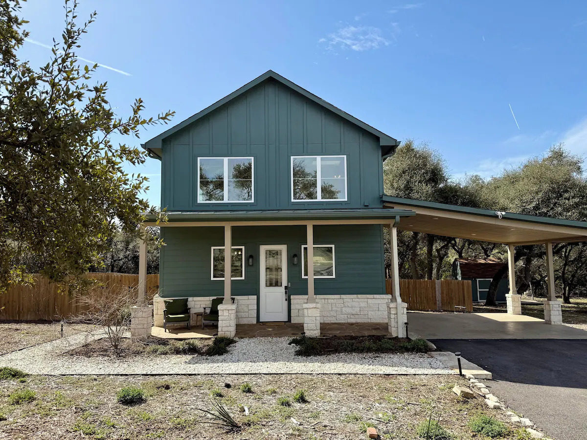 11605 Fitzhugh Road Austin, TX 78736 - Photo 2 of 24 a front view of a house with parking space
