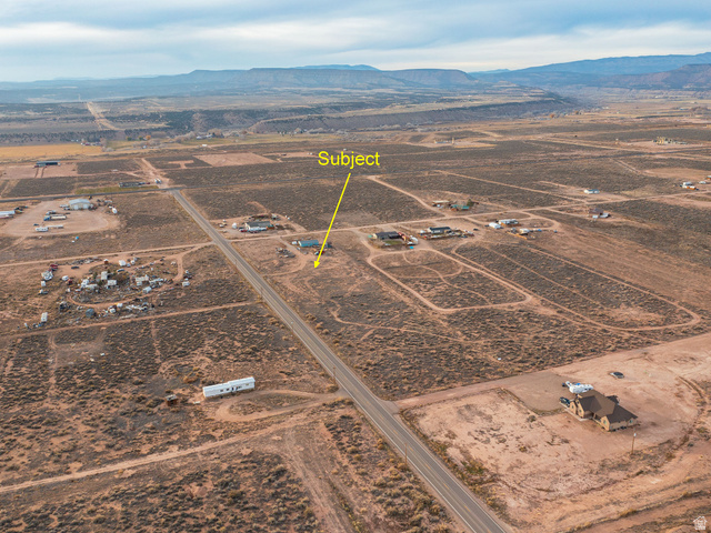 4963 20810 West Duchesne, UT 84021 - Photo 13 of 28 Overview of rural landscape with a mountainous background and property boundaries highlighted