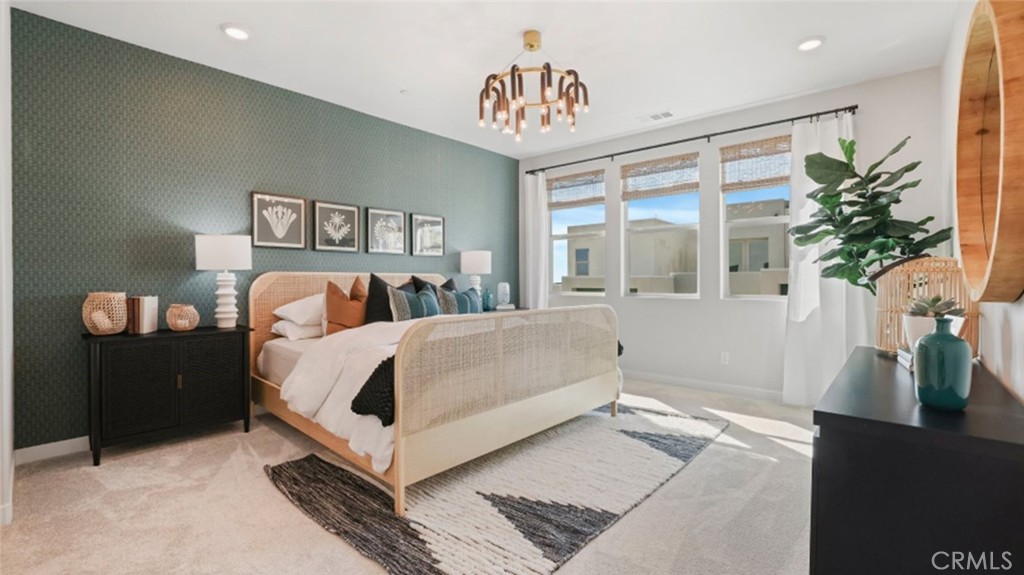 348 Mulberry Place Montebello, CA 90640 - Photo 14 of 39 a bedroom with a bed and a potted plant