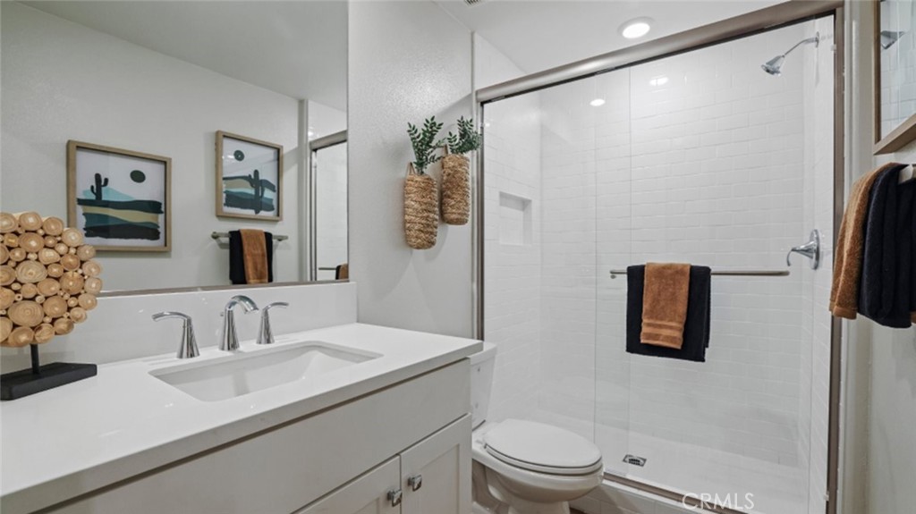 348 Mulberry Place Montebello, CA 90640 - Photo 21 of 39 a bathroom with a sink toilet and shower