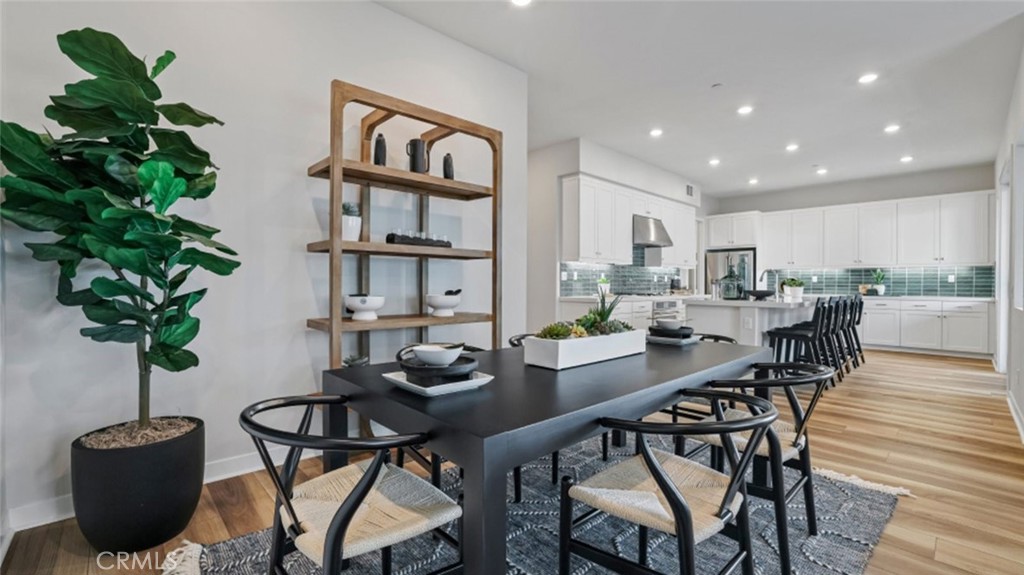 348 Mulberry Place Montebello, CA 90640 - Photo 6 of 39 a view of a dining room with furniture and a potted plant