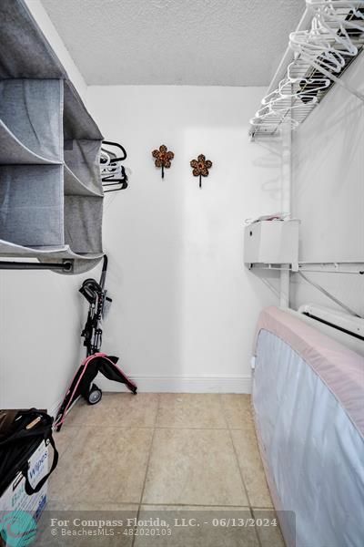 3410 Pinewalk Drive North, Unit 812 Pompano Beach, FL 33063 - Photo 14 of 26 a view of a room with gym equipment