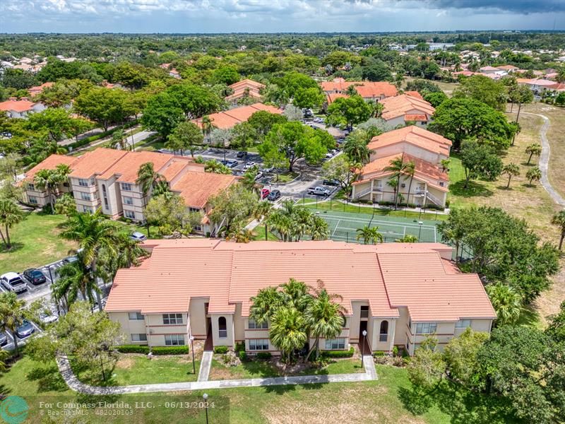 3410 Pinewalk Drive North, Unit 812 Pompano Beach, FL 33063 - Photo 21 of 26 an aerial view of residential houses with outdoor space and street view