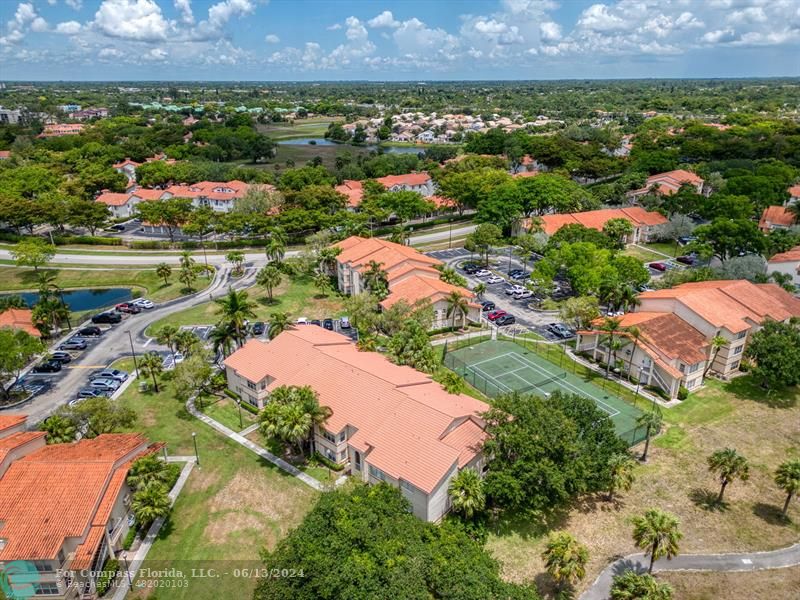 3410 Pinewalk Drive North, Unit 812 Pompano Beach, FL 33063 - Photo 22 of 26 an aerial view of residential houses with outdoor space and river