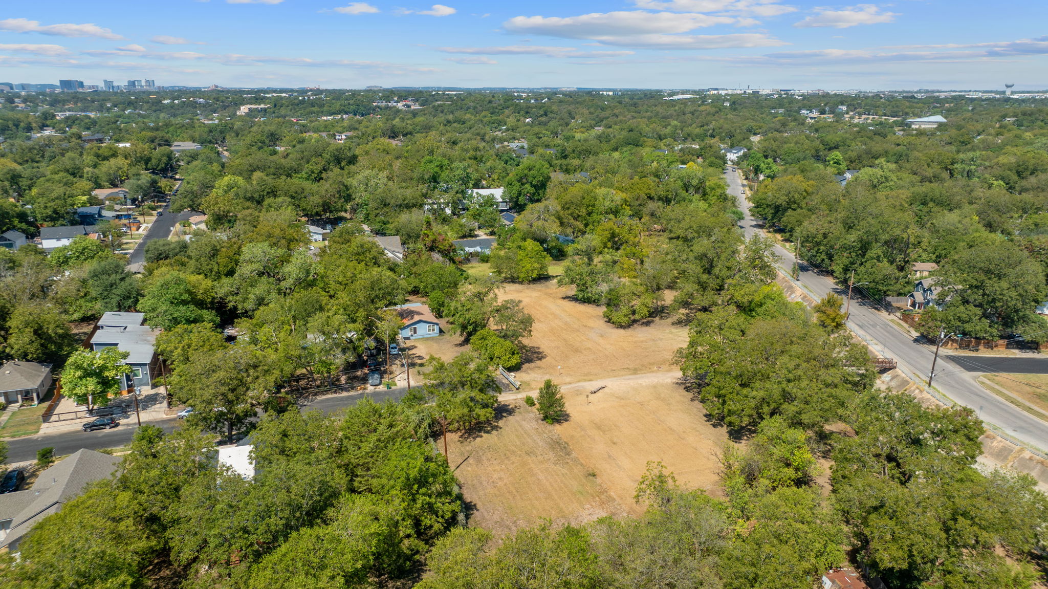 1135 Saucedo Street Austin, TX 78721 - Photo 6 of 6 a view of a lake with a city