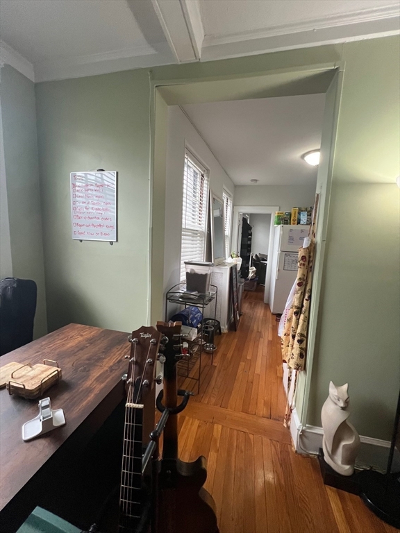 110 Lanark Road, Unit 5 Boston, MA 02135 - Photo 13 of 17 a view of a livingroom with furniture and hardwood floor