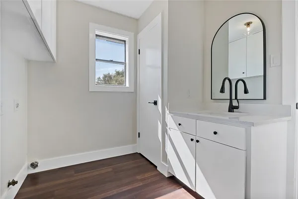 a view of a hallway with front door