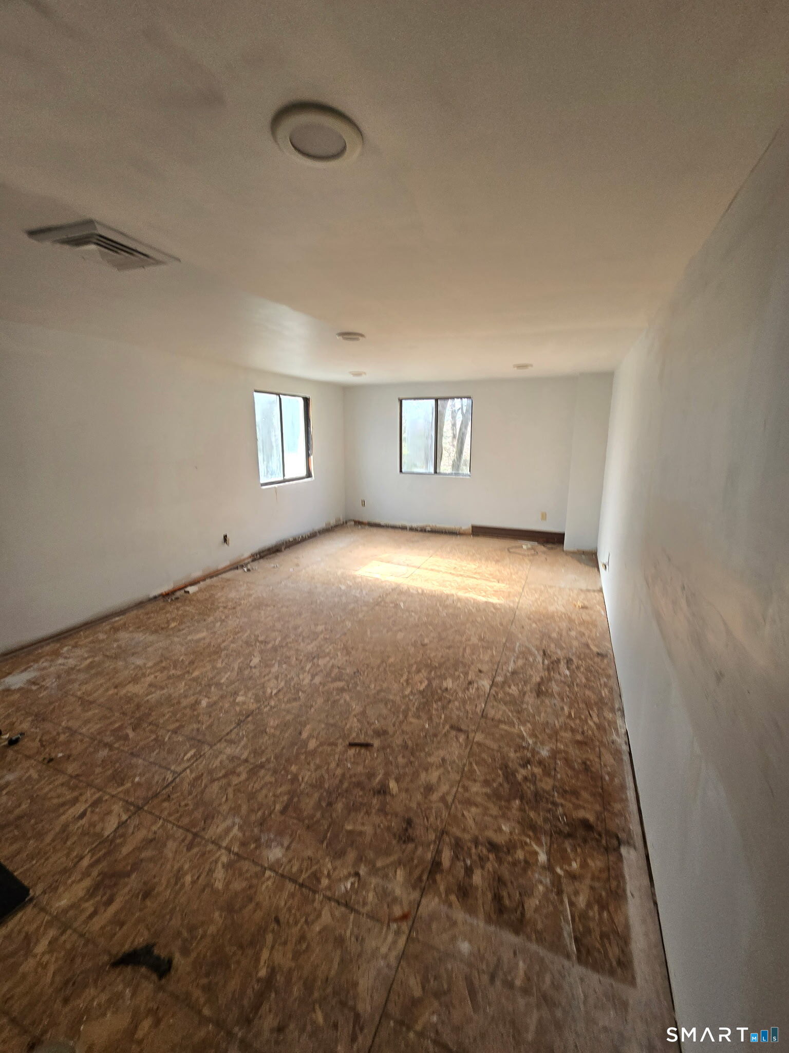 677 West Hill Road Stamford, CT 06902 - Photo 11 of 28 a view of an empty room with a window