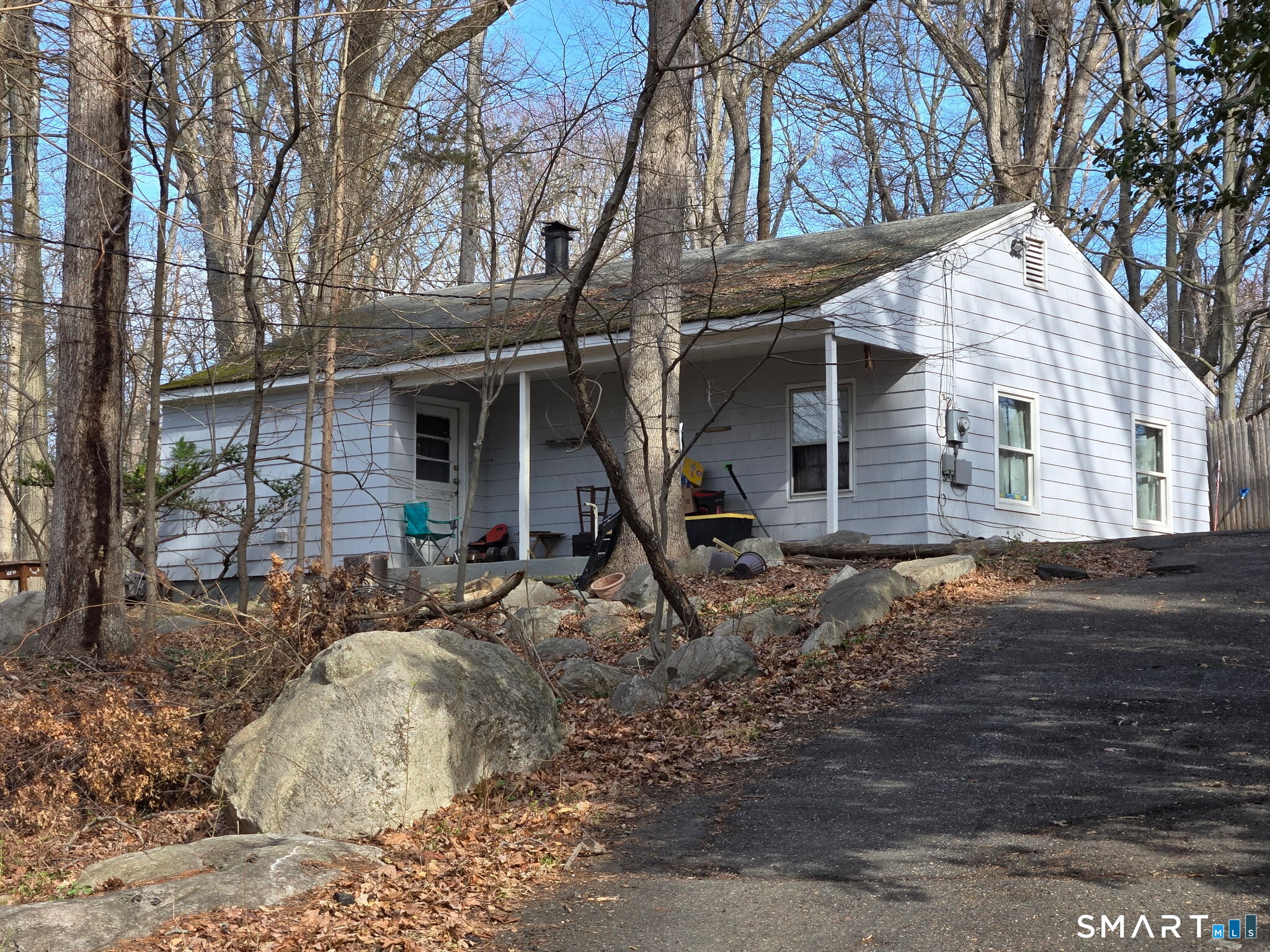 677 West Hill Road Stamford, CT 06902 - Photo 27 of 28 a view of a house with a yard
