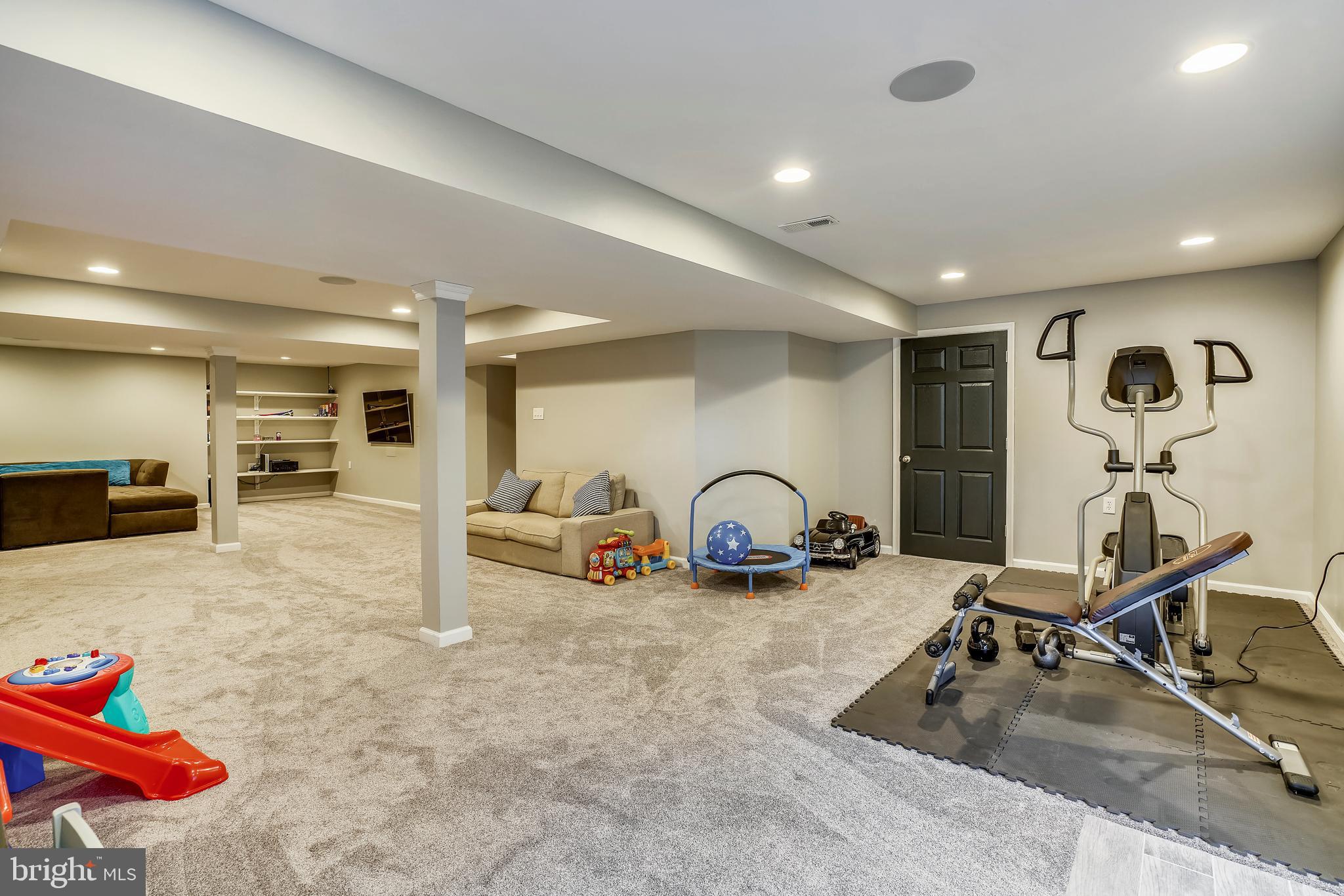 9617 Dapper Town Row Laurel, MD 20723 - Photo 32 of 36 Room to relax, play, work out and storage beyond