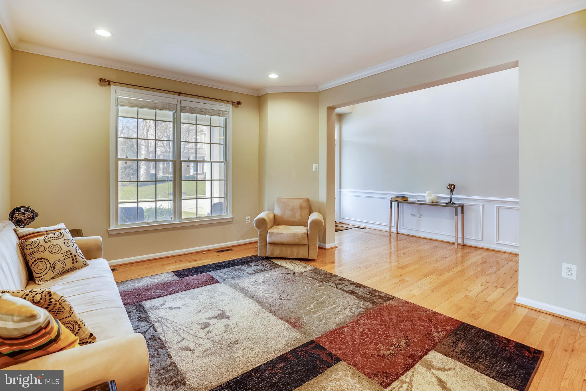 9617 Dapper Town Row Laurel, MD 20723 - Photo 6 of 36 Living room looking toward the 2 story foyer