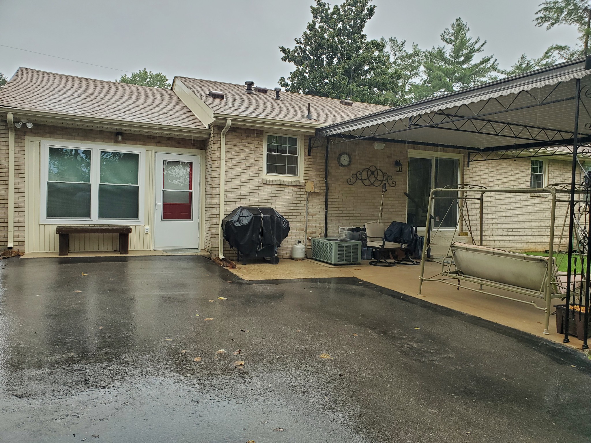 281 Le Bon Road Nashville, TN 37211 - Photo 28 of 30 a view of a house with a barbeque and potted plants