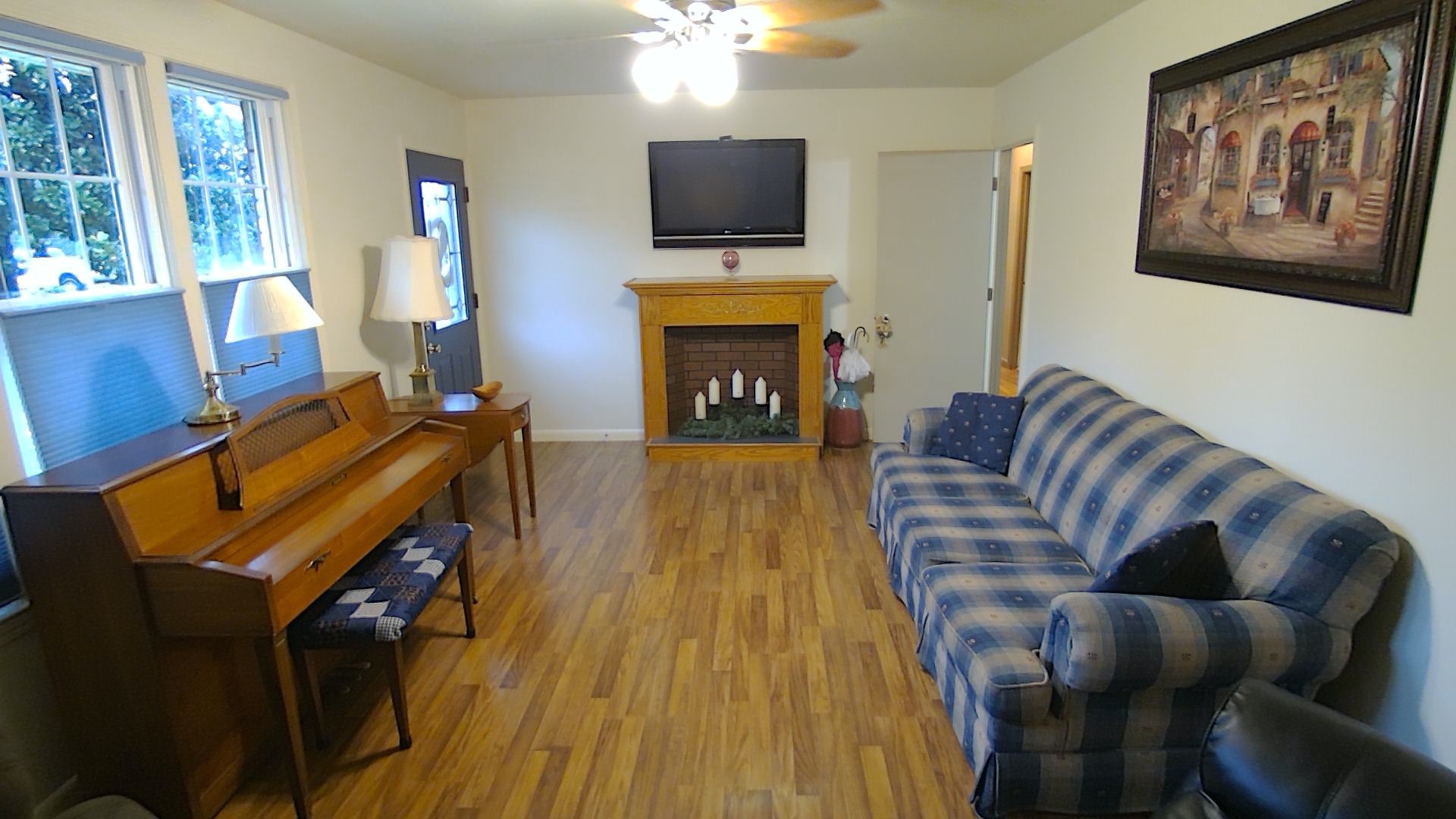 281 Le Bon Road Nashville, TN 37211 - Photo 6 of 30 a living room with furniture a flat screen tv and a fireplace