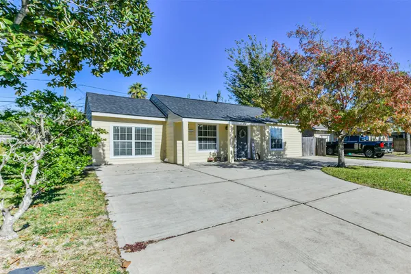 front view of a house with a yard