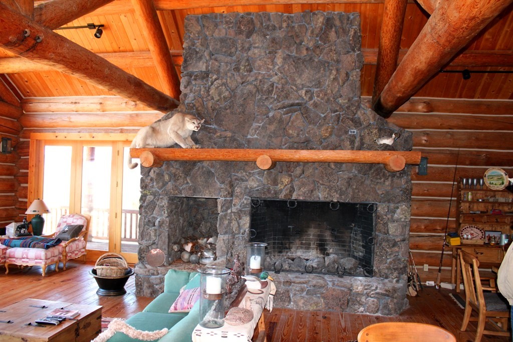663-150 Dixie Ranch Road McArthur, CA 96056 - Photo 6 of 40 a living room with furniture and a fireplace