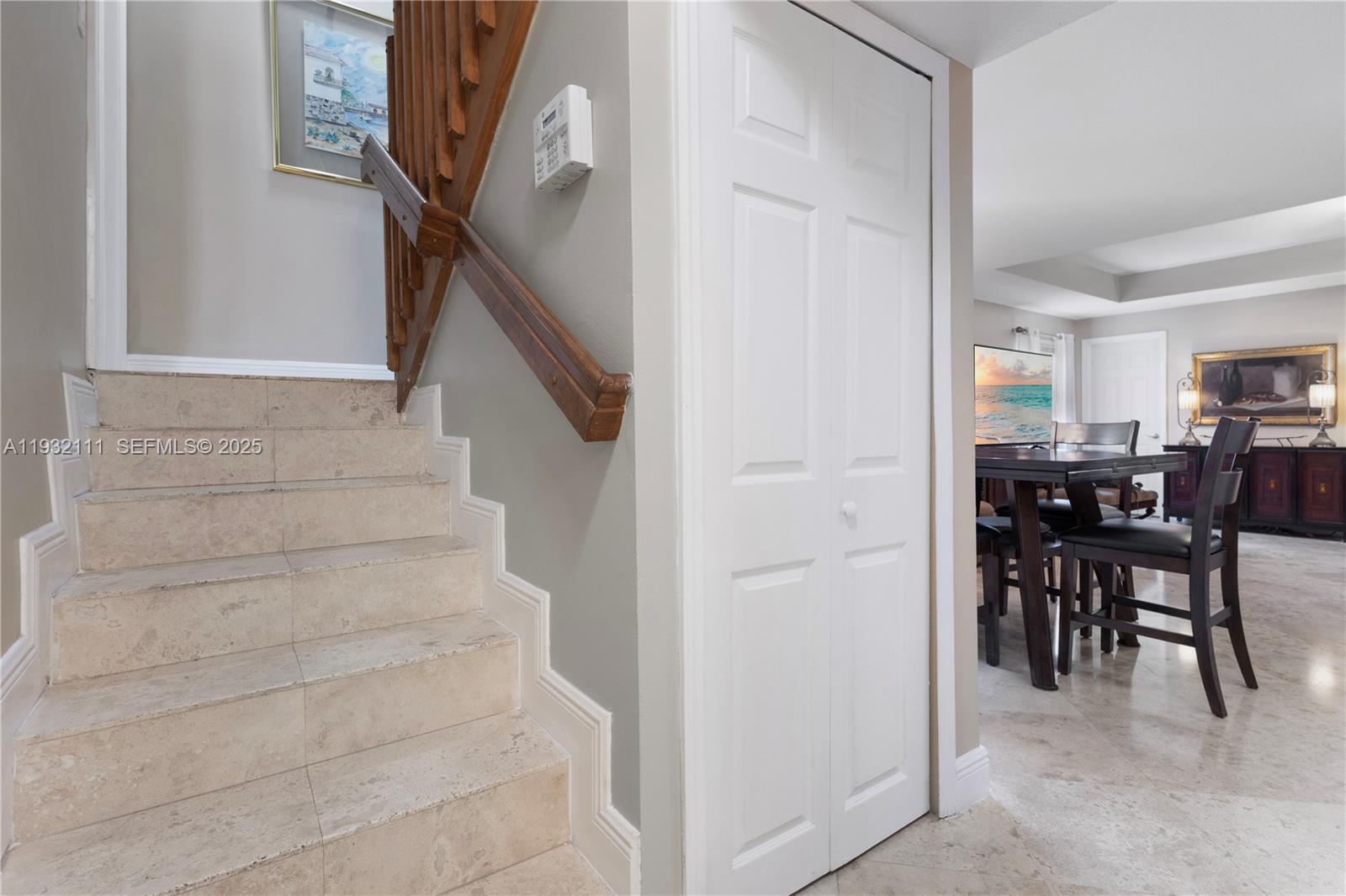 929 Southwest 11th Street, Unit H2 Miami, FL 33129 - Photo 12 of 46 a view of entryway and livingroom with furniture