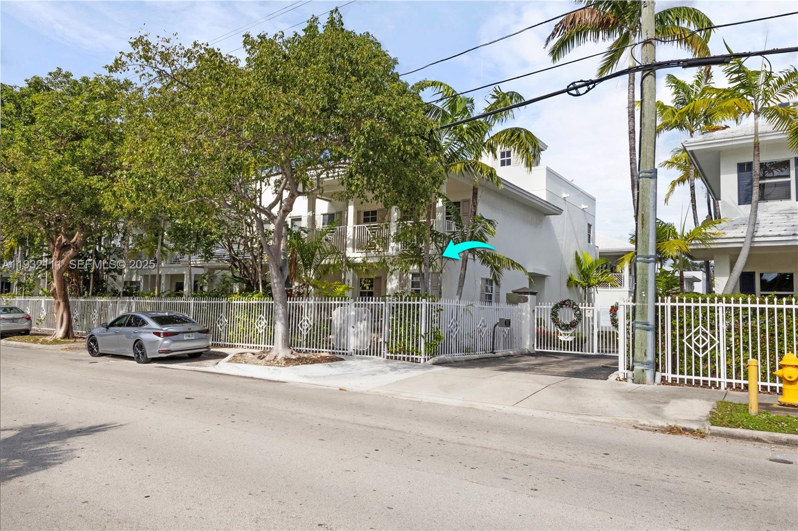 929 Southwest 11th Street, Unit H2 Miami, FL 33129 - Photo 2 of 46 a view of street with parked cars