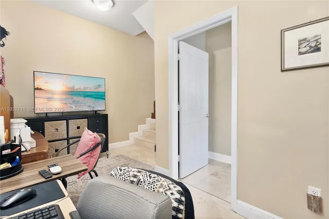 a en suite bathroom with a sink and mirror