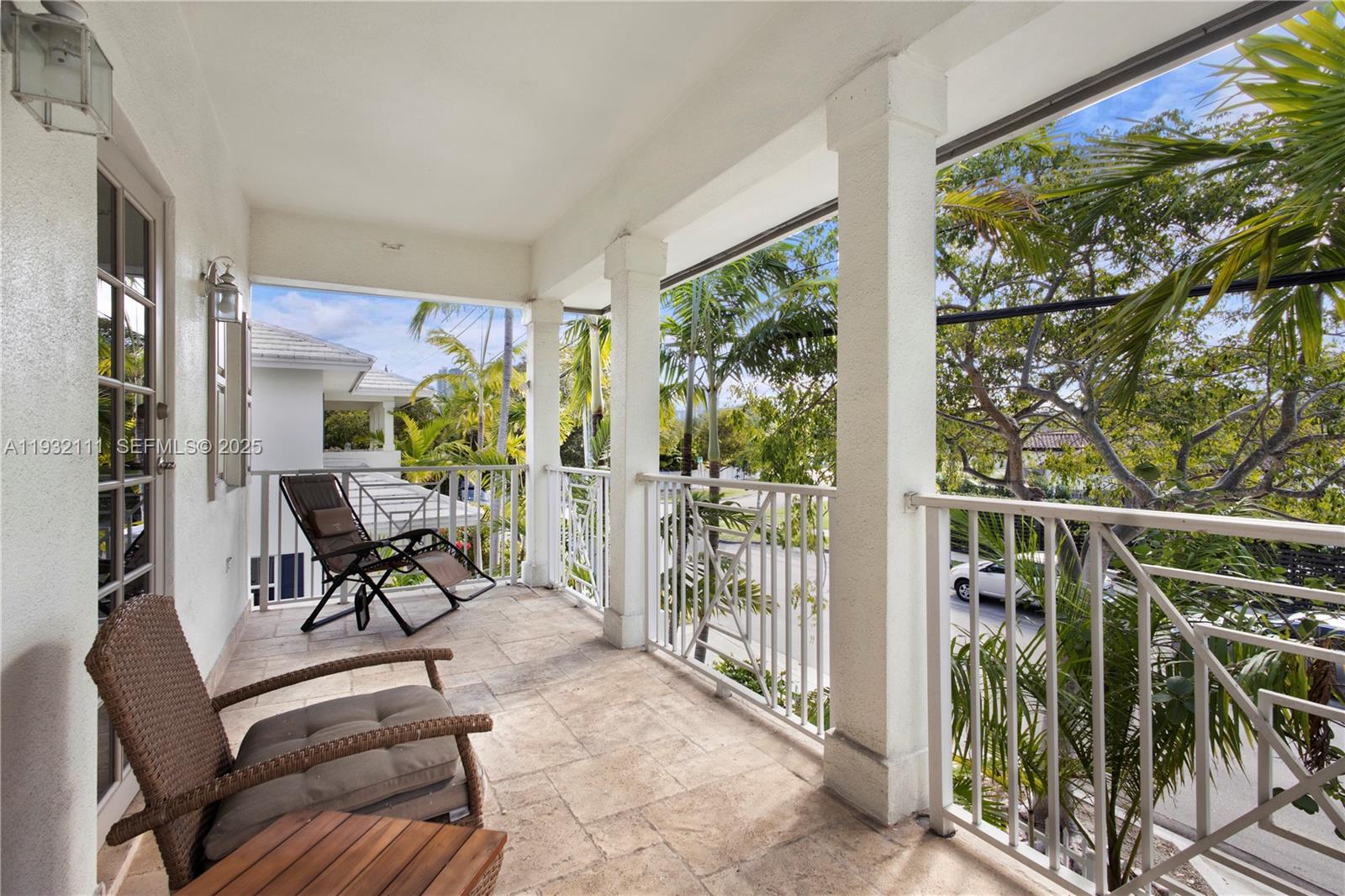 929 Southwest 11th Street, Unit H2 Miami, FL 33129 - Photo 27 of 46 a view of a porch with furniture