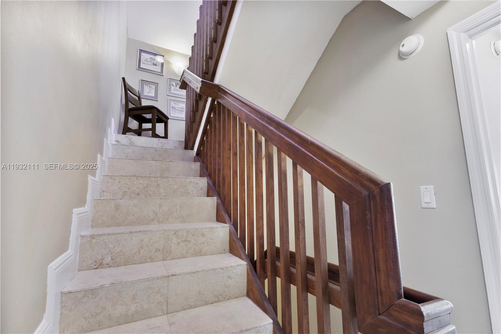 929 Southwest 11th Street, Unit H2 Miami, FL 33129 - Photo 29 of 46 a view of staircase with white walls and a window