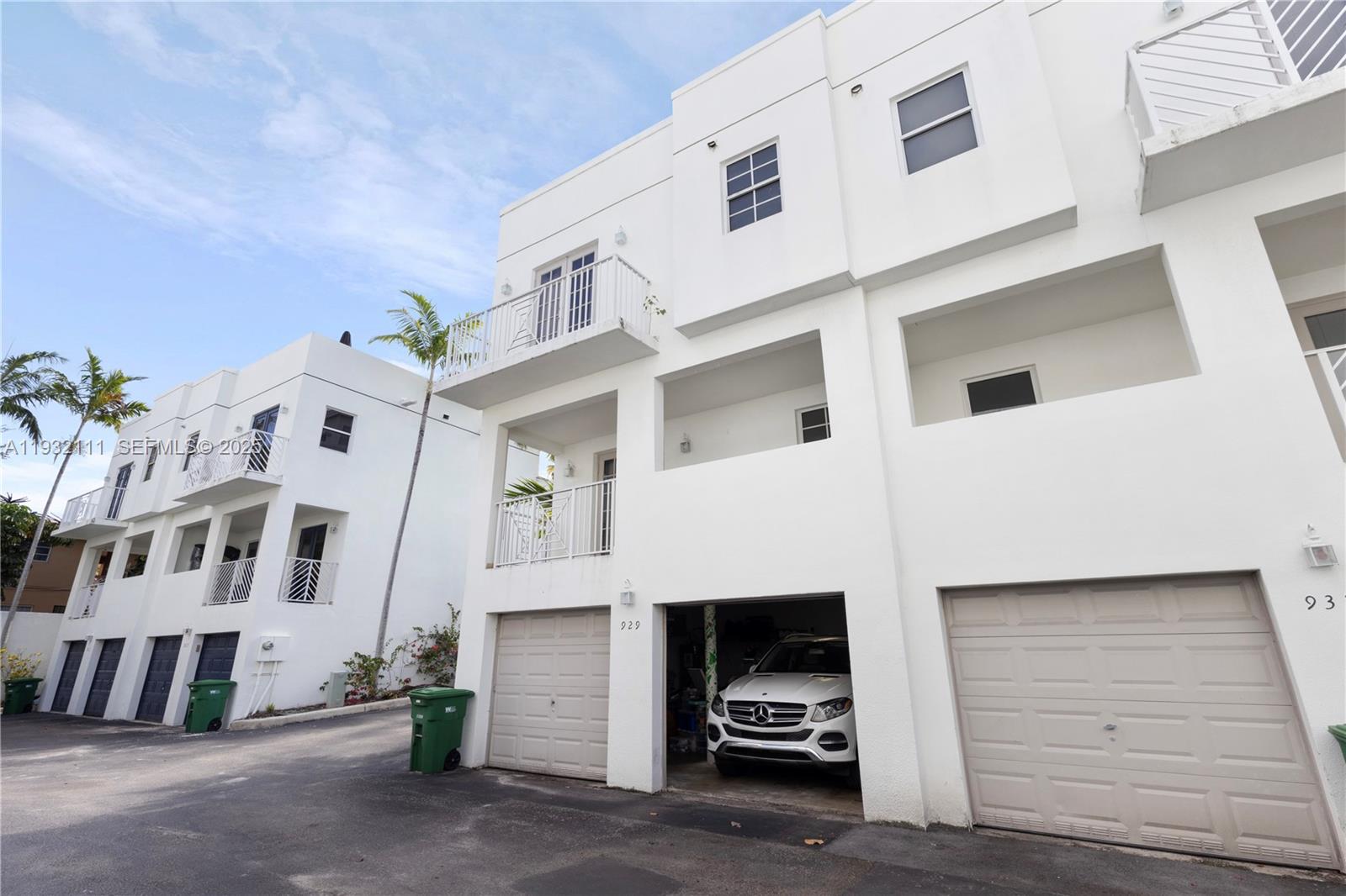 929 Southwest 11th Street, Unit H2 Miami, FL 33129 - Photo 36 of 46 a view of a white building with many windows