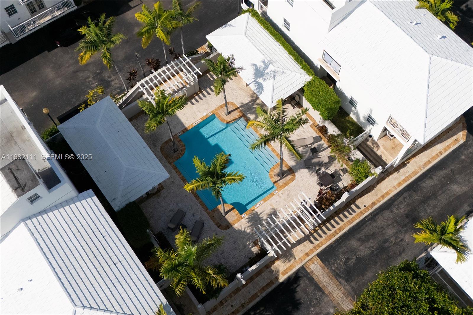 929 Southwest 11th Street, Unit H2 Miami, FL 33129 - Photo 39 of 46 an aerial view of a house with a backyard