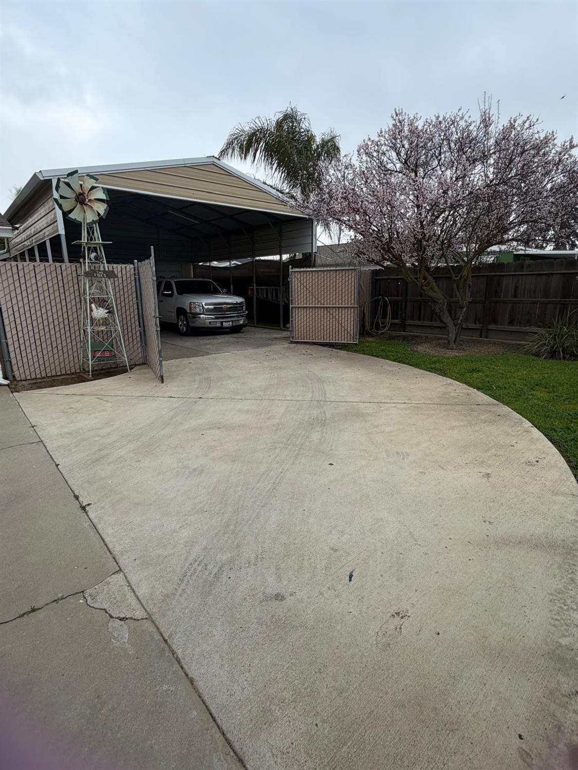 5109 Center Avenue Modesto, CA 95357 - Photo 17 of 45 a car parked in front of a house