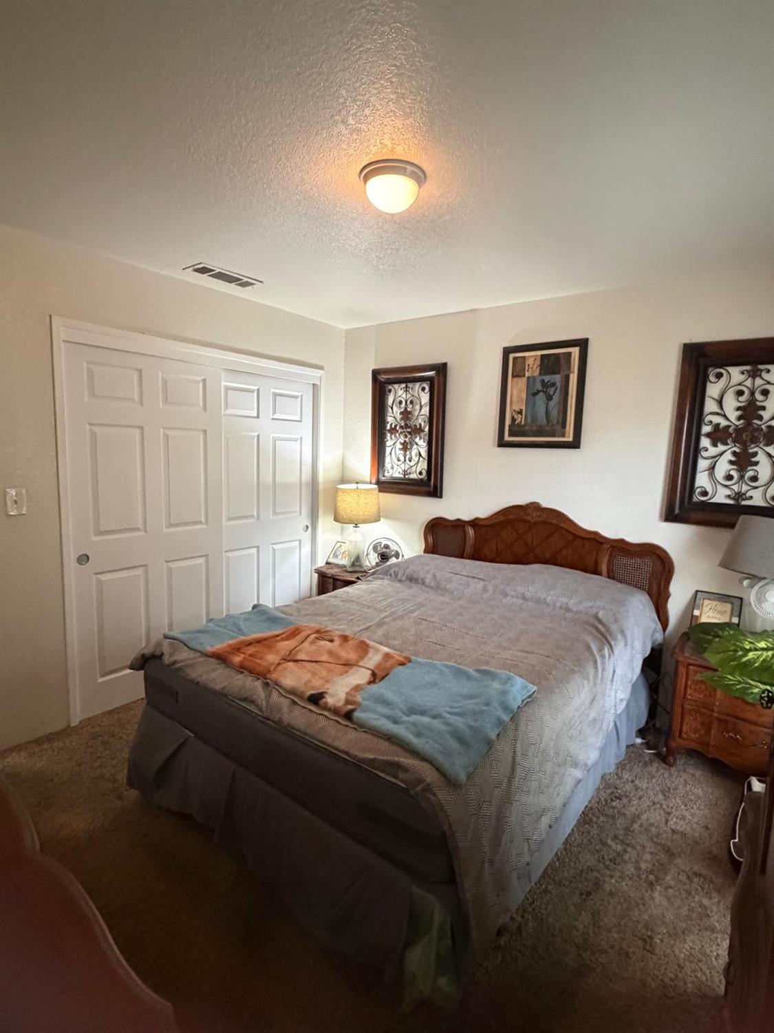 5109 Center Avenue Modesto, CA 95357 - Photo 36 of 45 a bedroom with a bed and a desk