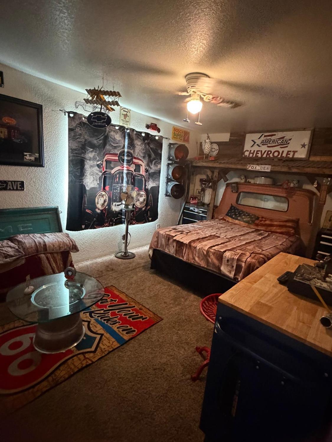 5109 Center Avenue Modesto, CA 95357 - Photo 38 of 45 a living room with furniture and a flat screen tv