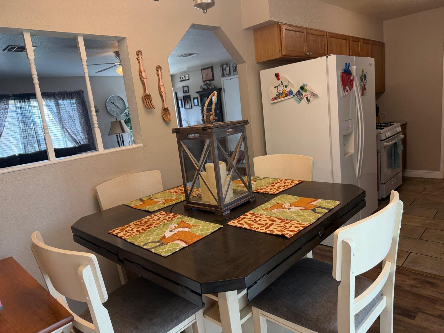 5109 Center Avenue Modesto, CA 95357 - Photo 4 of 45 a view of a dining room with furniture and a window