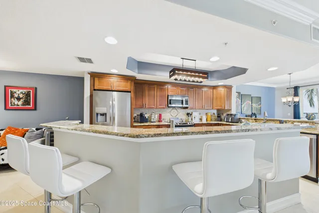 a view of a balcony with chairs