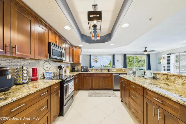 a view of balcony with wooden floor and fence