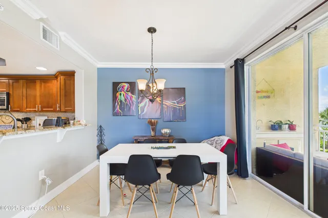 a bedroom with furniture and a flat screen tv