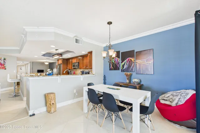 a view of a livingroom with workspace and a couch