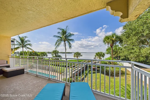 a view of a lake with a building in front of it