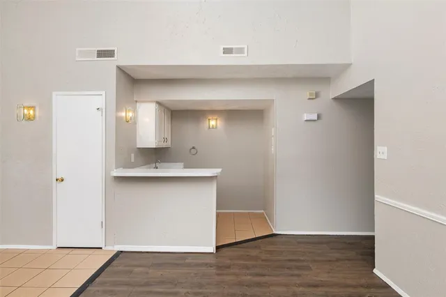 a view of a sink and a mirror