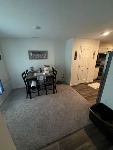 a view of a livingroom with furniture