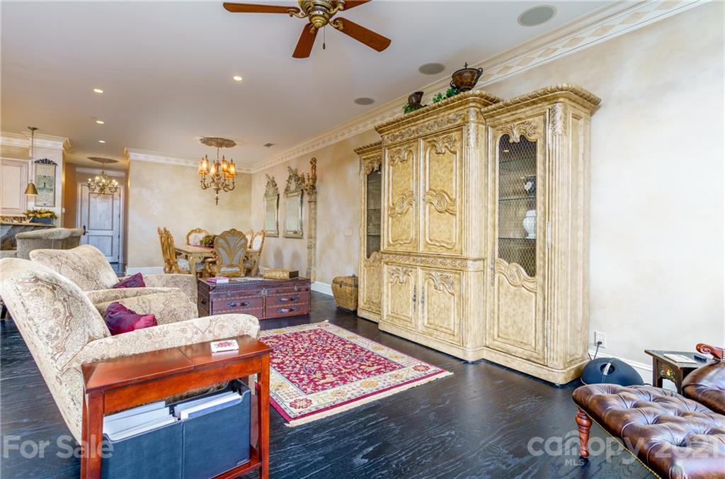 2823 Providence Road, Unit 235 Charlotte, NC 28211 - Photo 15 of 37 a living room with furniture and wooden floor