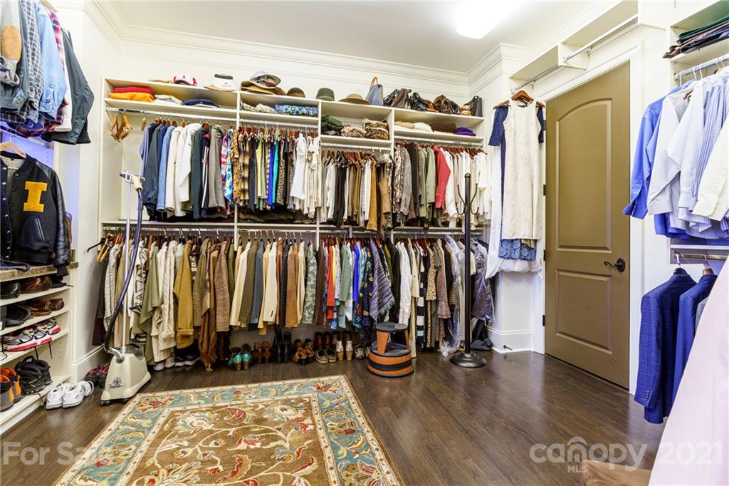 2823 Providence Road, Unit 235 Charlotte, NC 28211 - Photo 19 of 37 a view of walk in closet with clothes