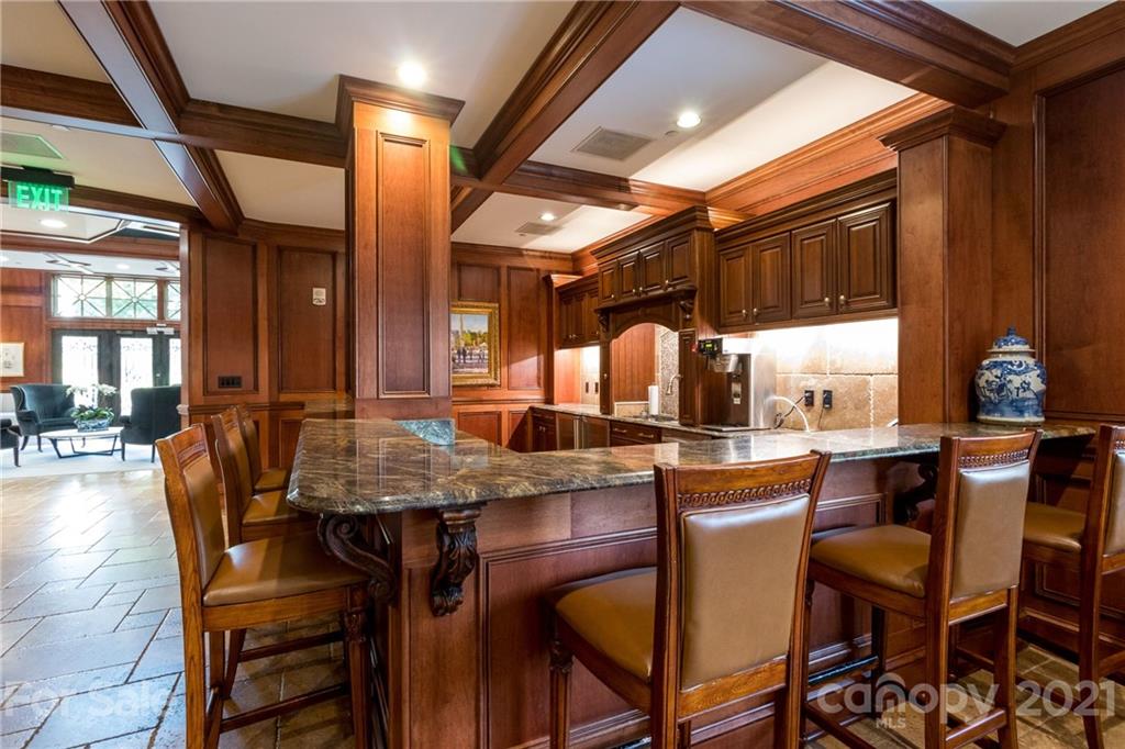 2823 Providence Road, Unit 235 Charlotte, NC 28211 - Photo 26 of 37 a dining room with chairs and window