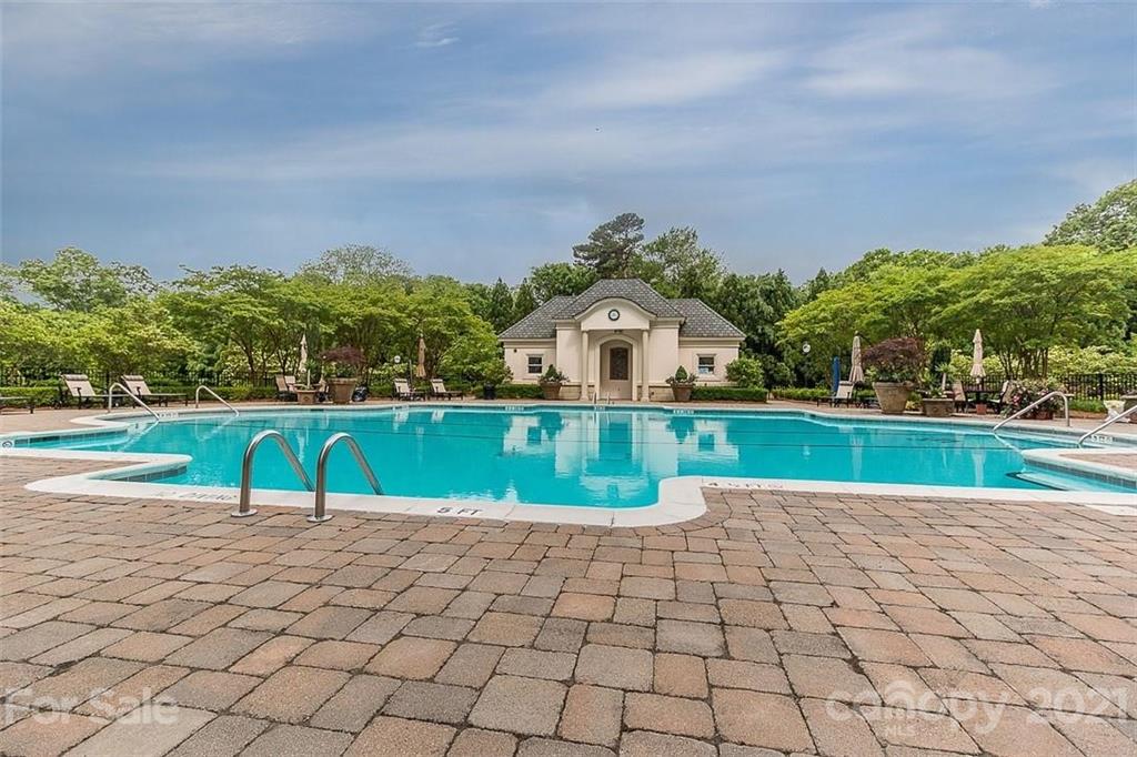 2823 Providence Road, Unit 235 Charlotte, NC 28211 - Photo 33 of 37 a view of swimming pool with a yard