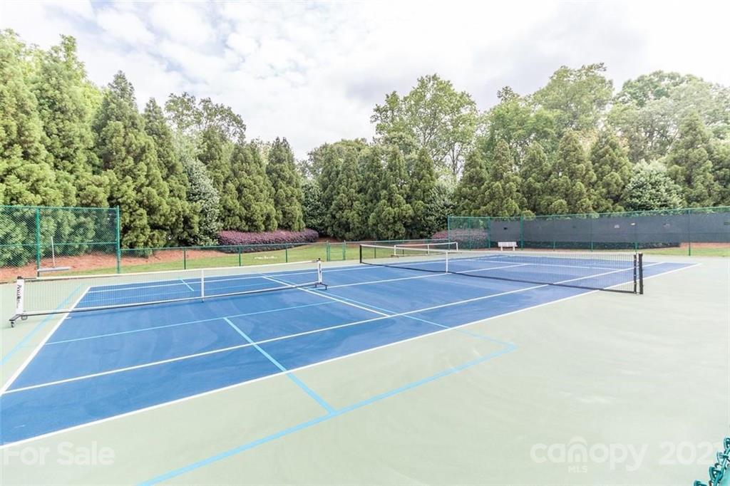 2823 Providence Road, Unit 235 Charlotte, NC 28211 - Photo 34 of 37 a view of an outdoor space and tennis court