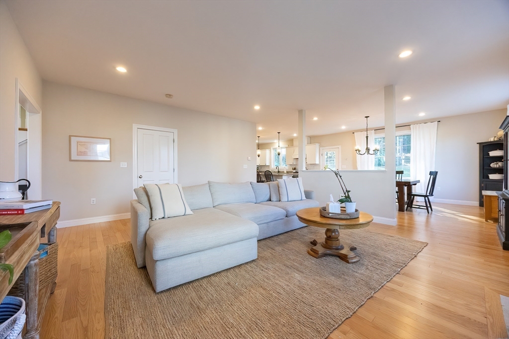 4 Sheppards Way Ipswich, MA 01938 - Photo 12 of 37 a living room with furniture and a table