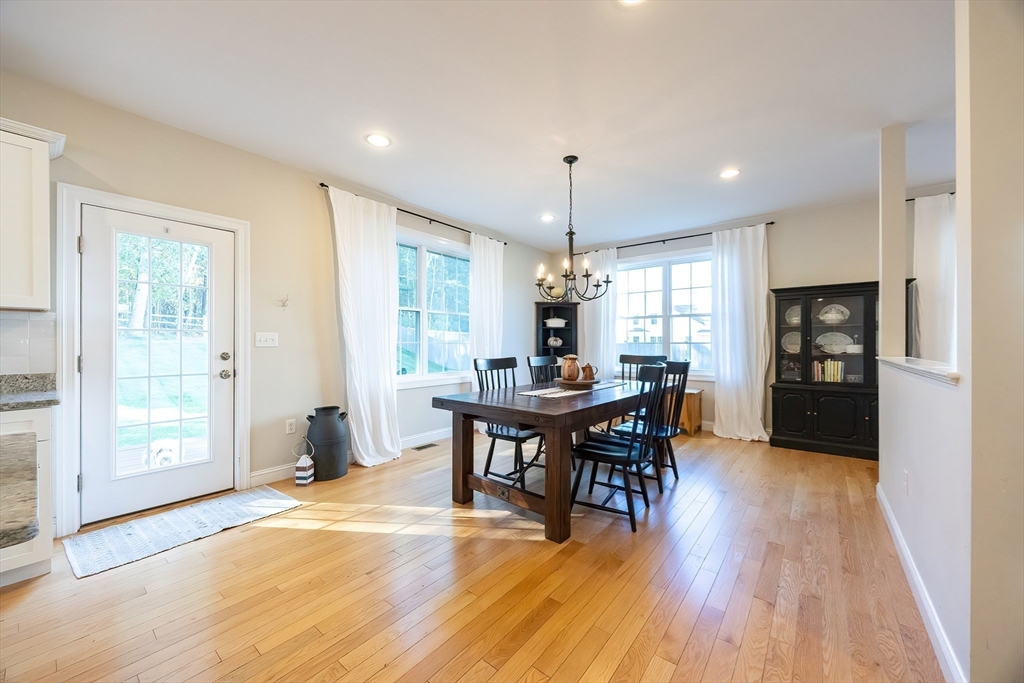 4 Sheppards Way Ipswich, MA 01938 - Photo 14 of 37 a view of a dining room with furniture window and wooden floor