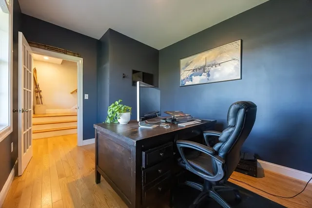 a room with a bed and a window