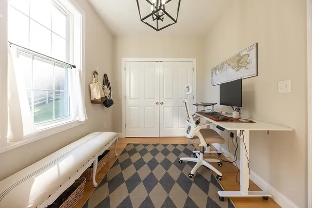 a bathroom with a toilet sink and shower