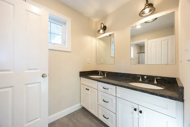 a view of a kitchen with a sink and a microwave