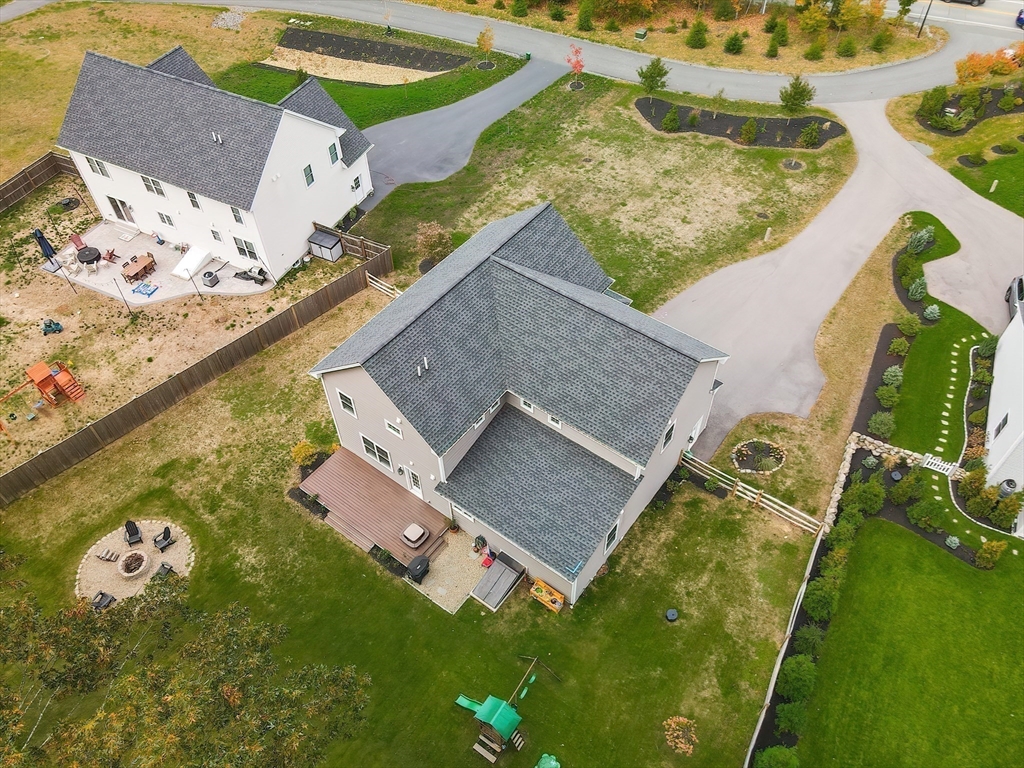 4 Sheppards Way Ipswich, MA 01938 - Photo 9 of 37 an aerial view of a house with a yard