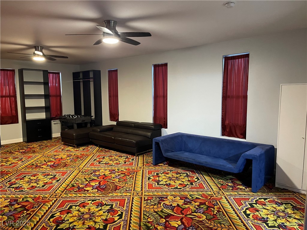 6480 West Oquendo Road Las Vegas, NV 89118 - Photo 18 of 51 Living area featuring a ceiling fan