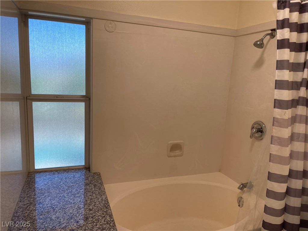 6480 West Oquendo Road Las Vegas, NV 89118 - Photo 35 of 51 Bathroom with shower / bath combination with curtain
